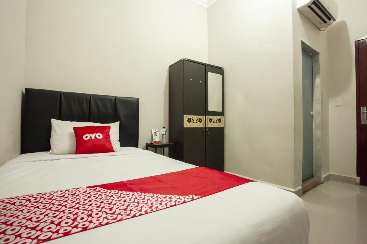 Oyo 1631 Hotel Apple Perdagangan-Tomuon Exterior photo