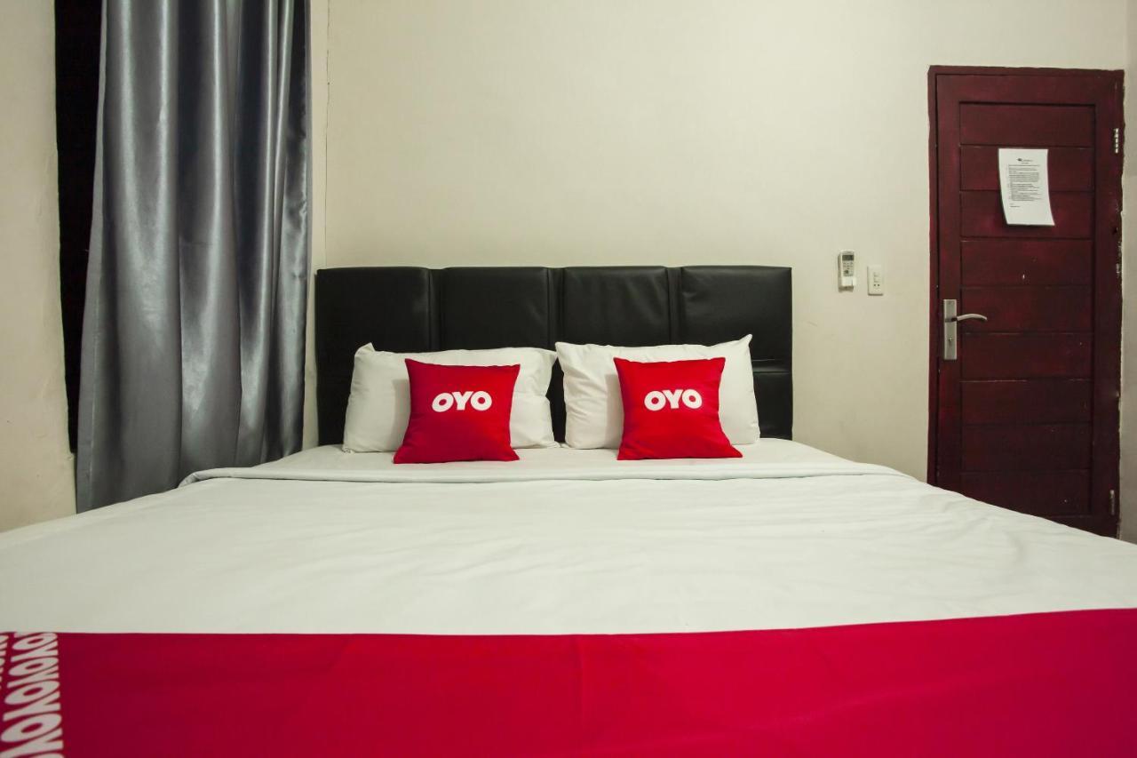 Oyo 1631 Hotel Apple Perdagangan-Tomuon Exterior photo