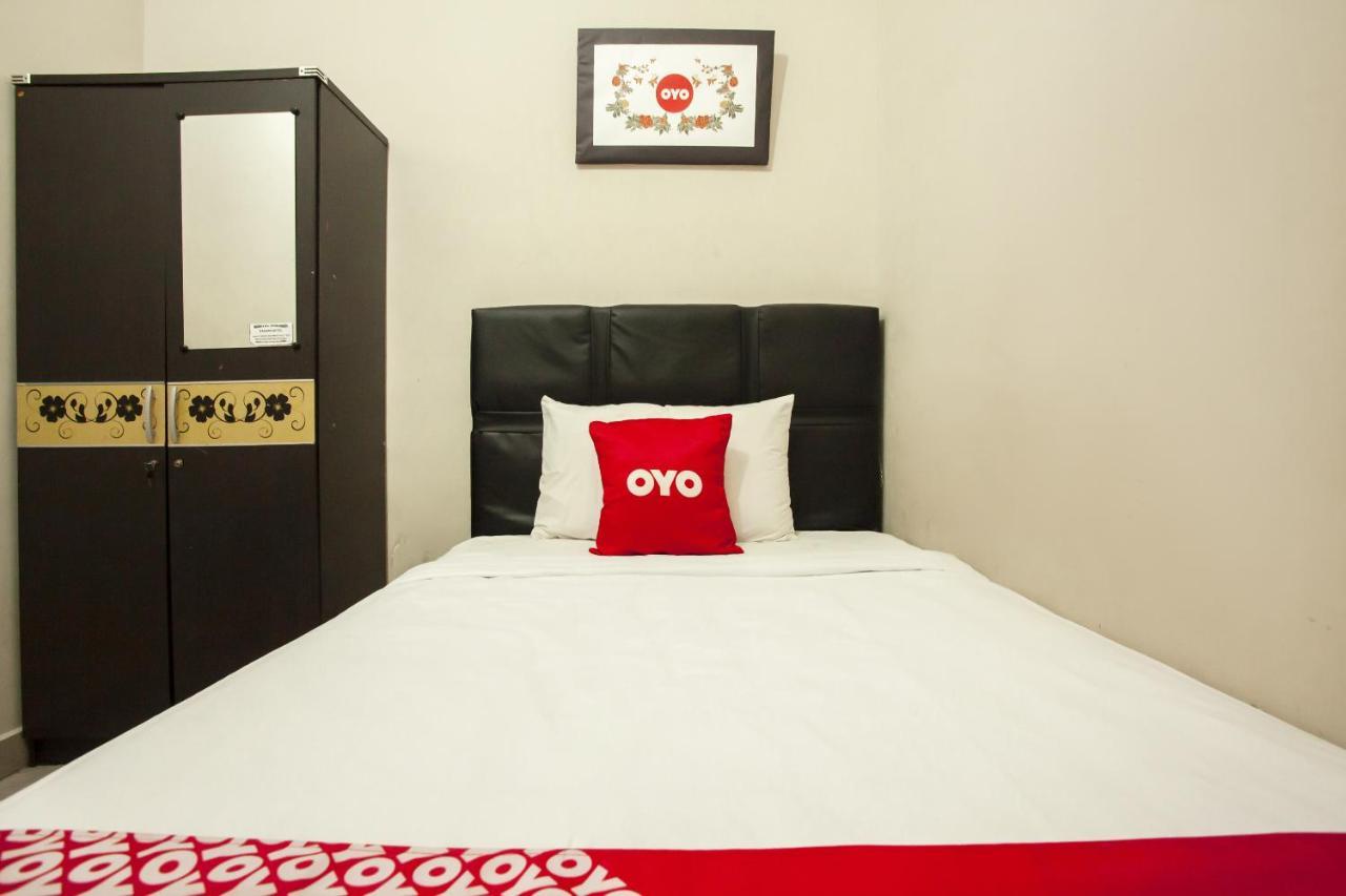 Oyo 1631 Hotel Apple Perdagangan-Tomuon Exterior photo
