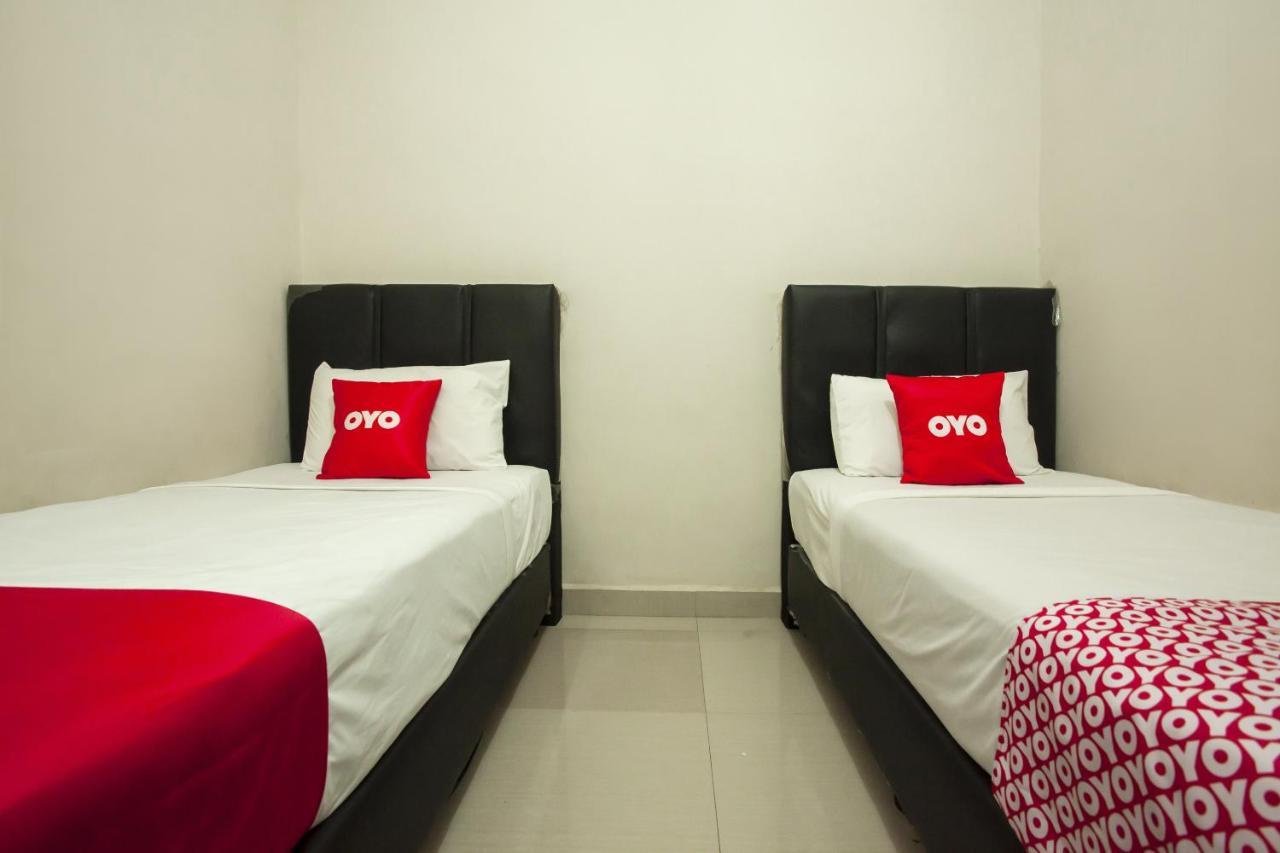Oyo 1631 Hotel Apple Perdagangan-Tomuon Exterior photo